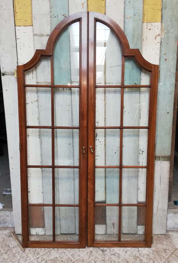 CS0030 SET OF 4 RECLAIMED ARCHED MAHOGANY AND GLASS CUPBOARD DOORS