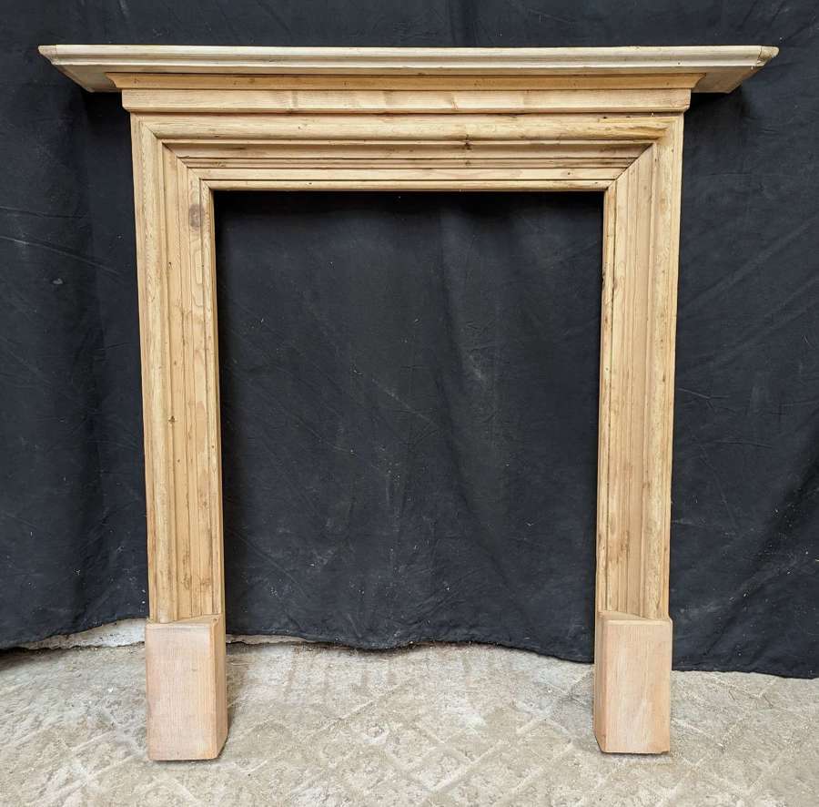 FS0310 A SMALL FIRE SURROUND MADE USING RECLAIMED PINE ELEMENTS