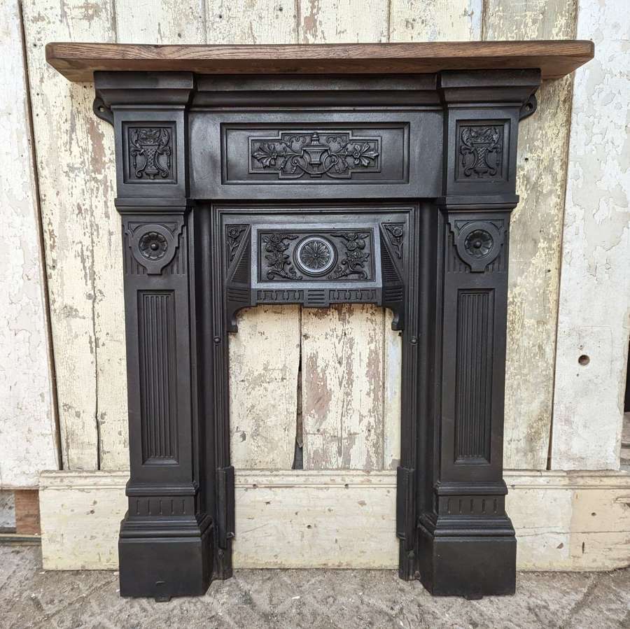FF0020 A RECLAIMED VICTORIAN CAST IRON FIRE FRONT WITH OAK MANTEL