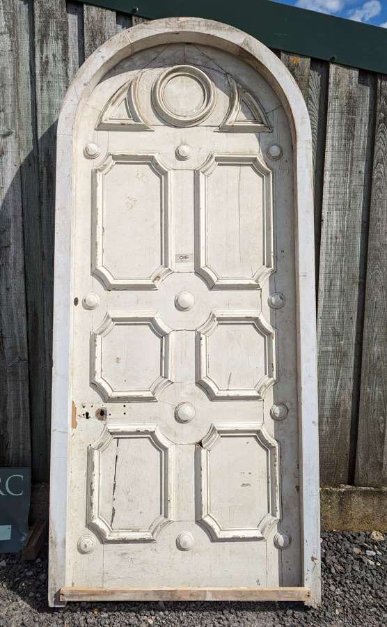 DI0933 A VERY LARGE ORNATE ARCH TOPPED INTERNAL PINE DOOR AND FRAME