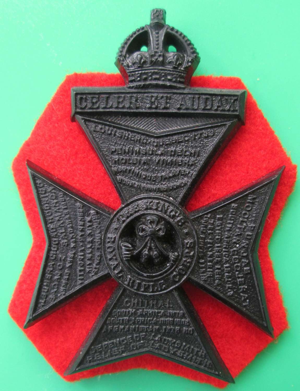 THE KING'S OWN ROYAL RIFLE CORPS PLASTIC CAP BADGE
