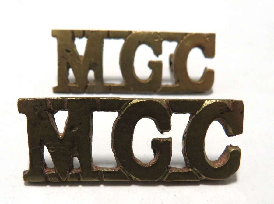 Pair of WW1 Machine Gun Corps Shoulder Titles