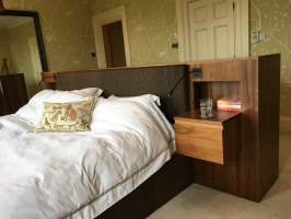 Bespoke furniture to place the bed in the centre of the room