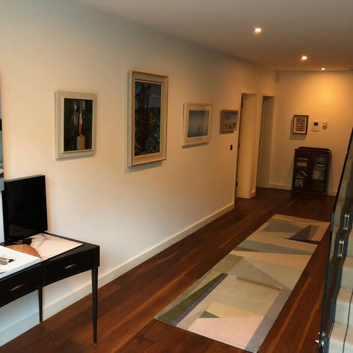 Devon - A dark ground floor landing transformed into the perfect Art Gallery 