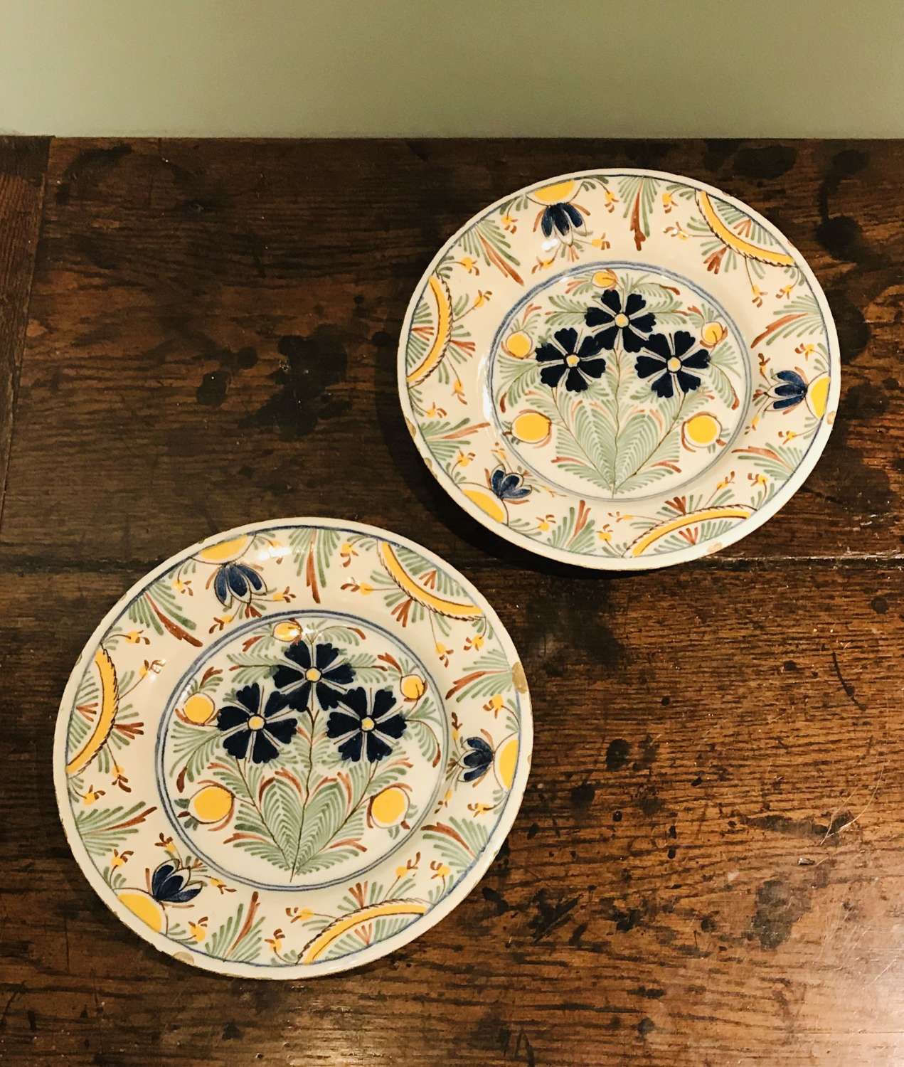A pair of 18th c Dutch Delft polychrome plates
