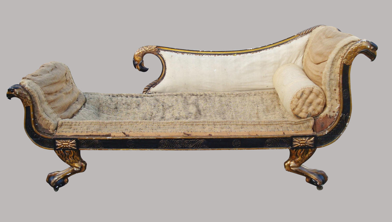Regency carved black and giltwood daybed in the manner of George Smith