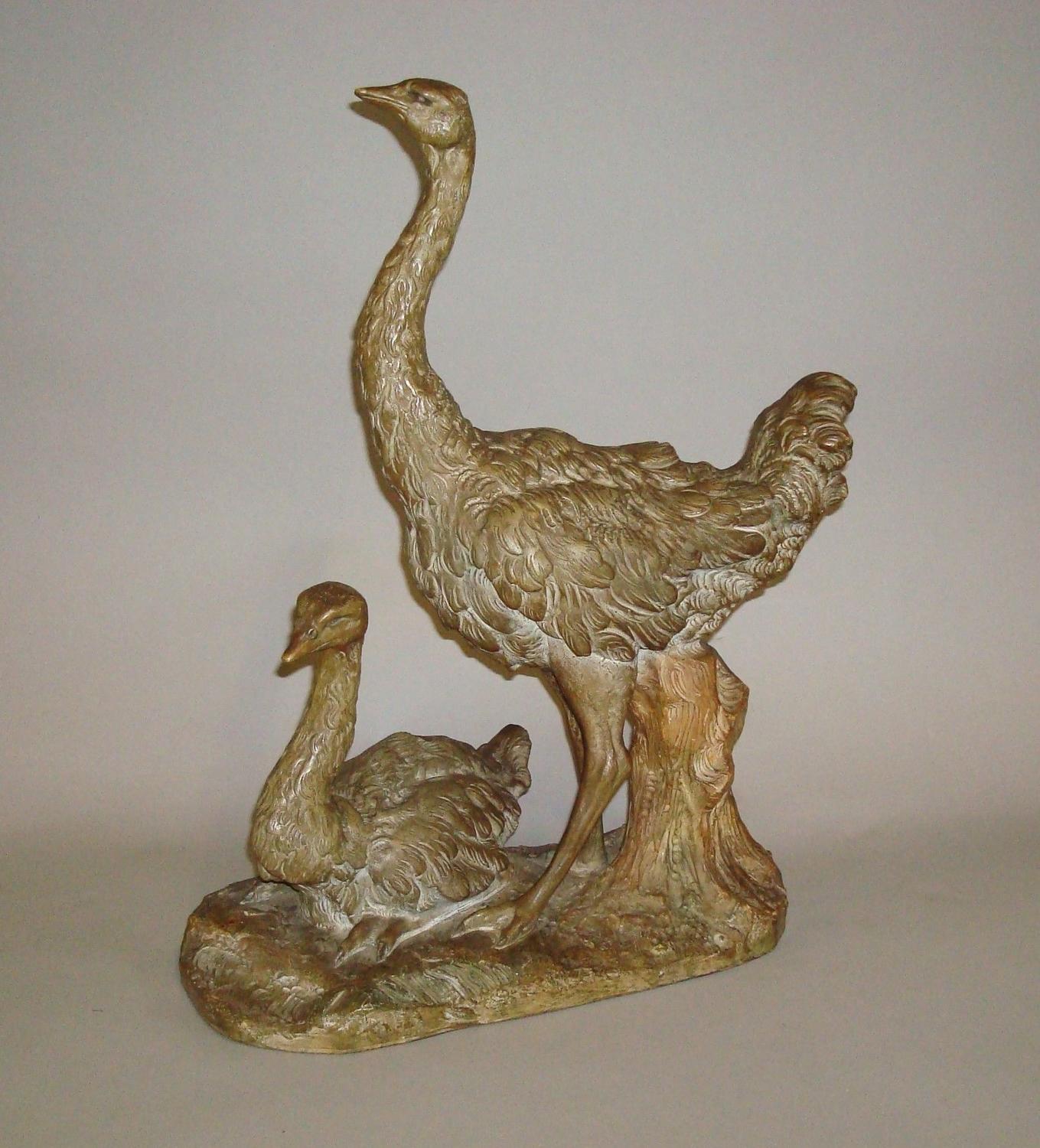 20th century terracotta sculpture of two ostriches