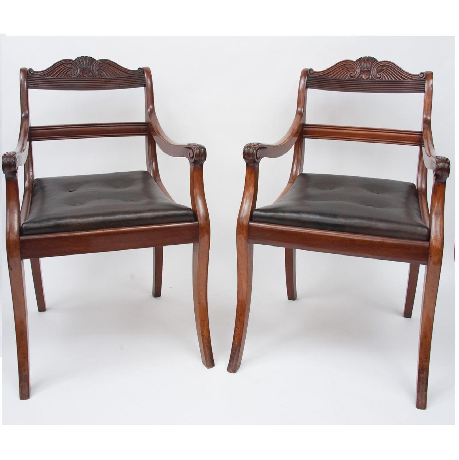 C19th pair of mahogany open armchairs