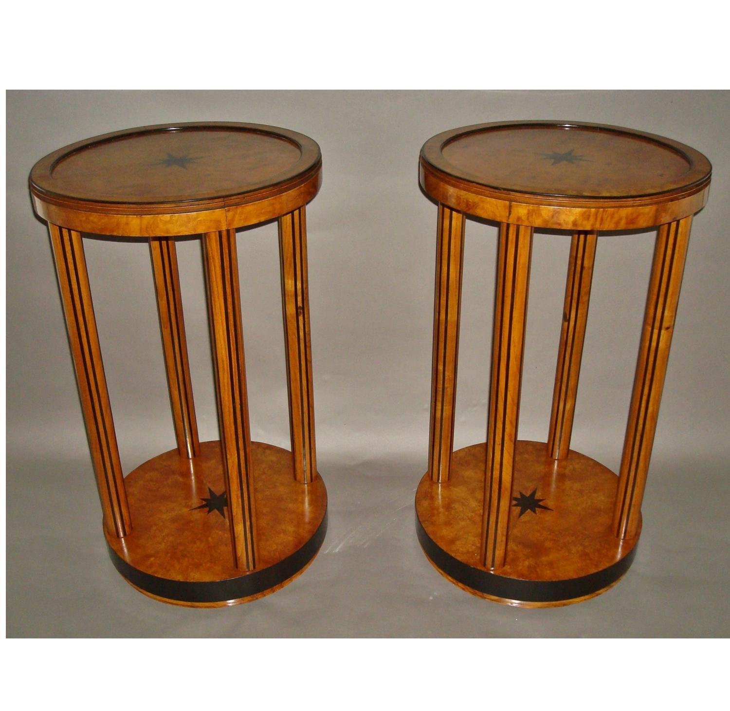 A pair of burr elm and ebony occasional tables
