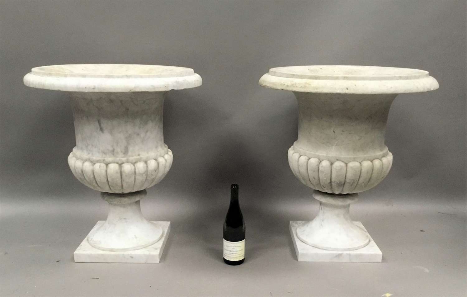 An impressive C19th pair of carrara marble urns