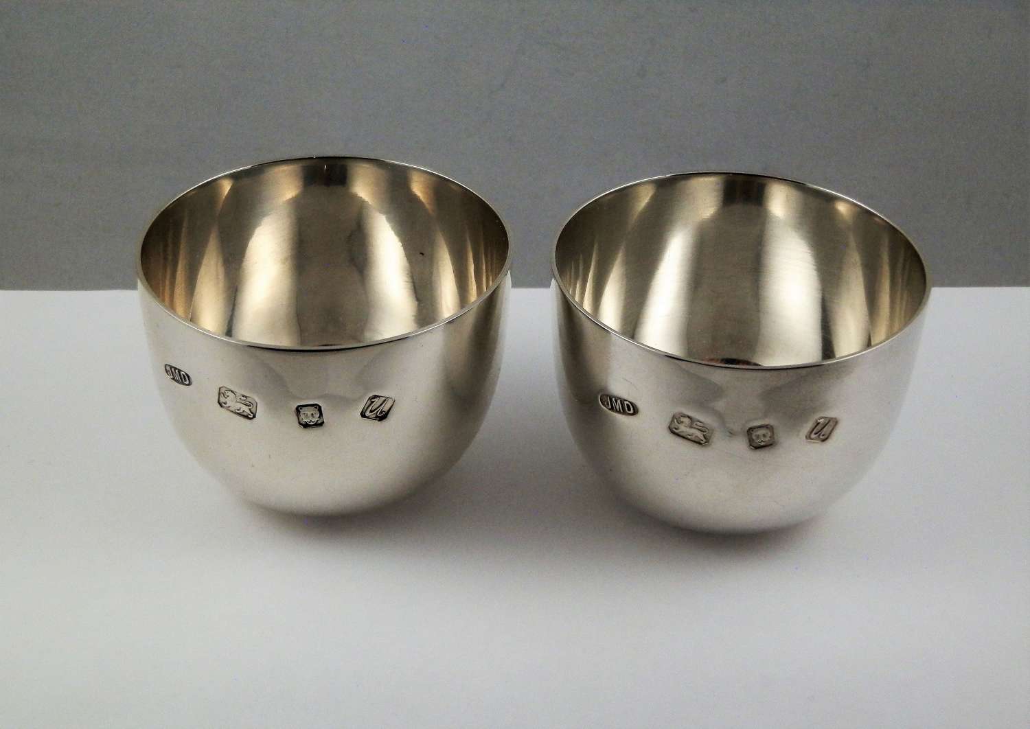 Pair of silver tumbler cups, London 1994