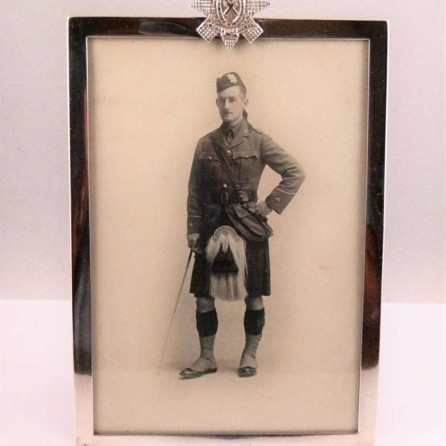 A WW1 Chester silver frame, Black Watch badge, 1915