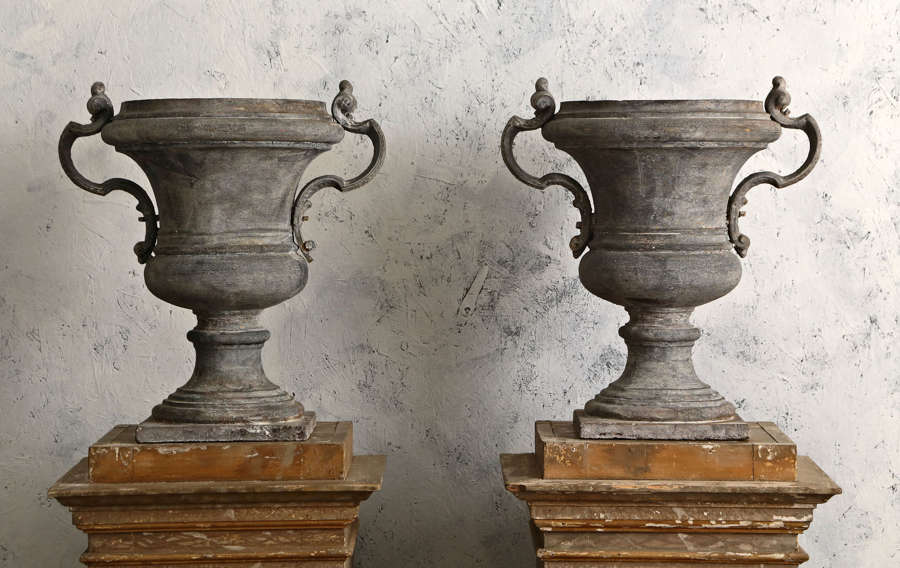 Pair of 18th century French cast iron urns