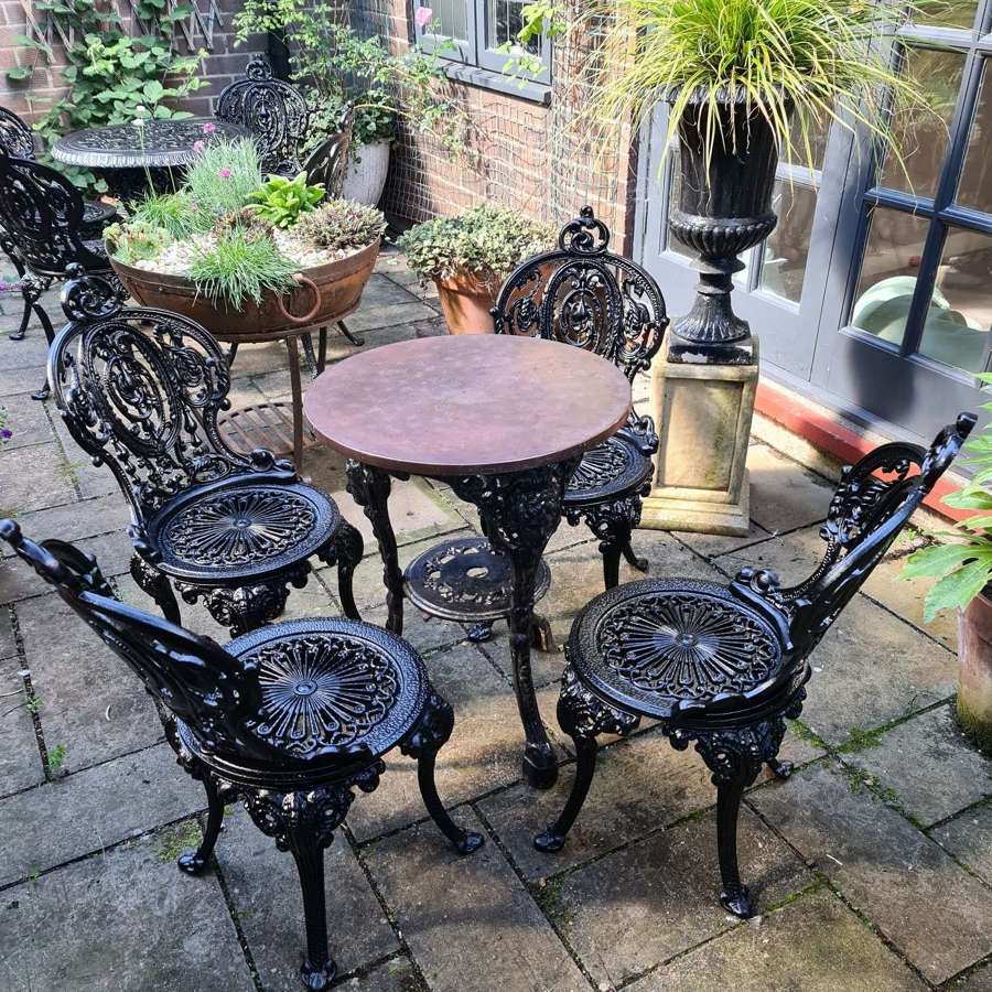 Wonderful heavy Cast-iron Garden Set of Table and Four Chairs