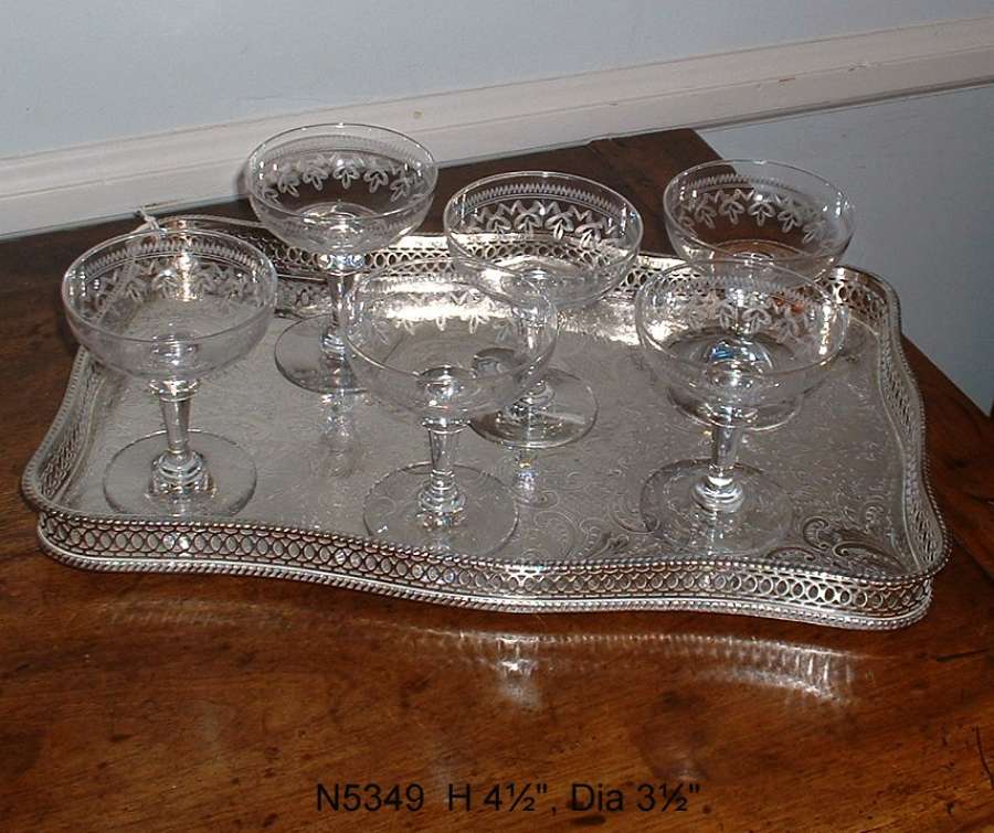 Six engraved champagne coupes
