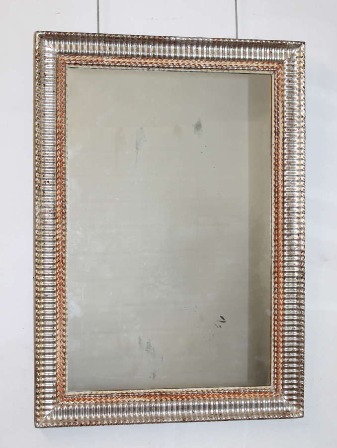 Antique French silverleafed ripple framed mirror