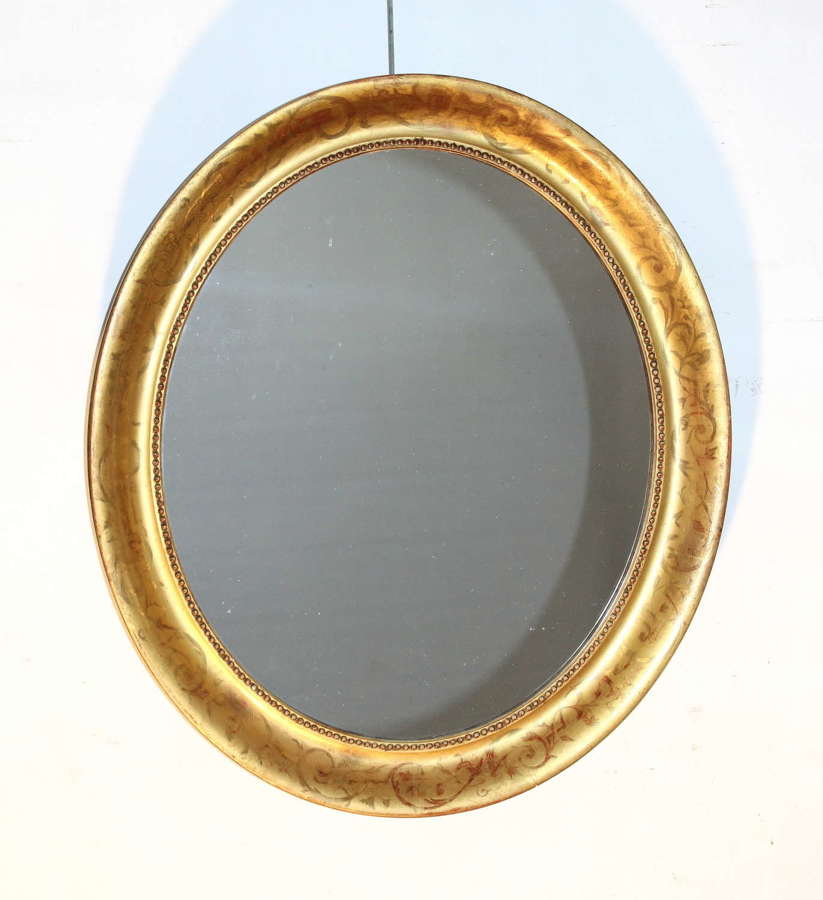 Antique French oval mirror with delicately etched frame