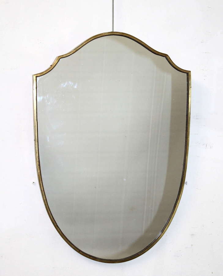 Sheild-shaped mid-century modern Italian mirror with brass frame