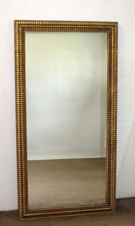 Antique French mirror with gilt rippled frame
