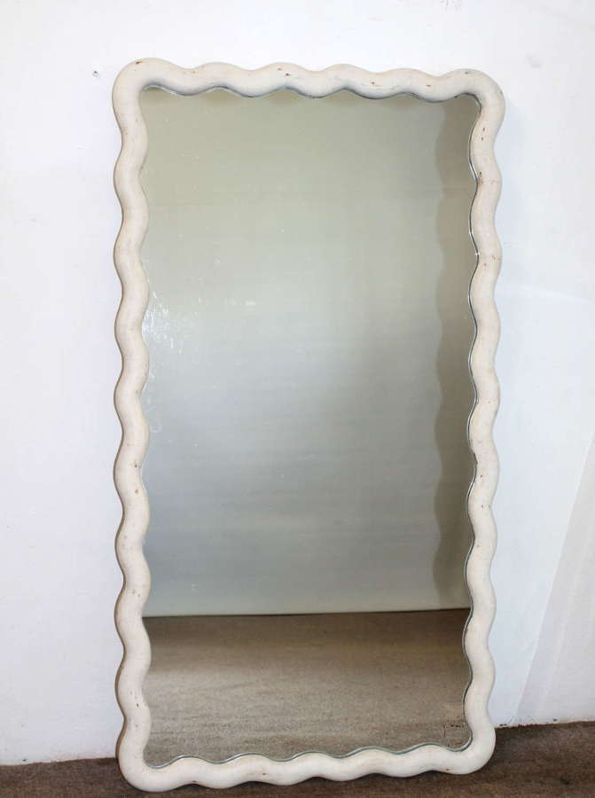 Antique French mirror with wavy cream frame
