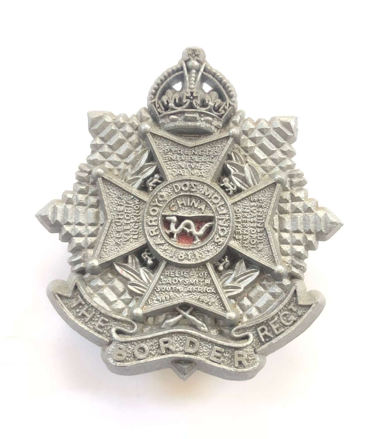 Border Regiment WW2 plastic economy cap badge.