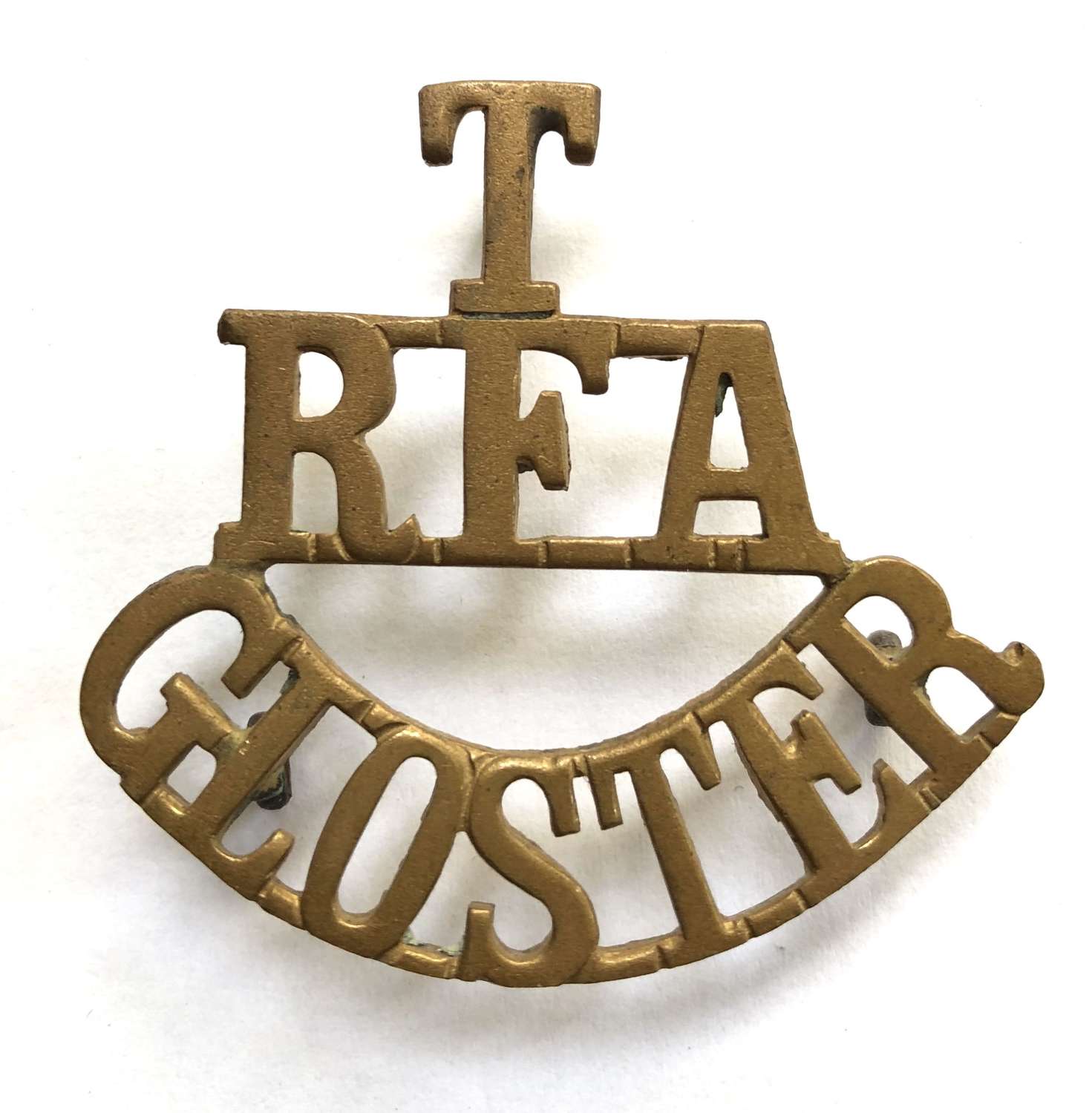 T / RFA / GLOSTER brass shoulder title circa 1908-21