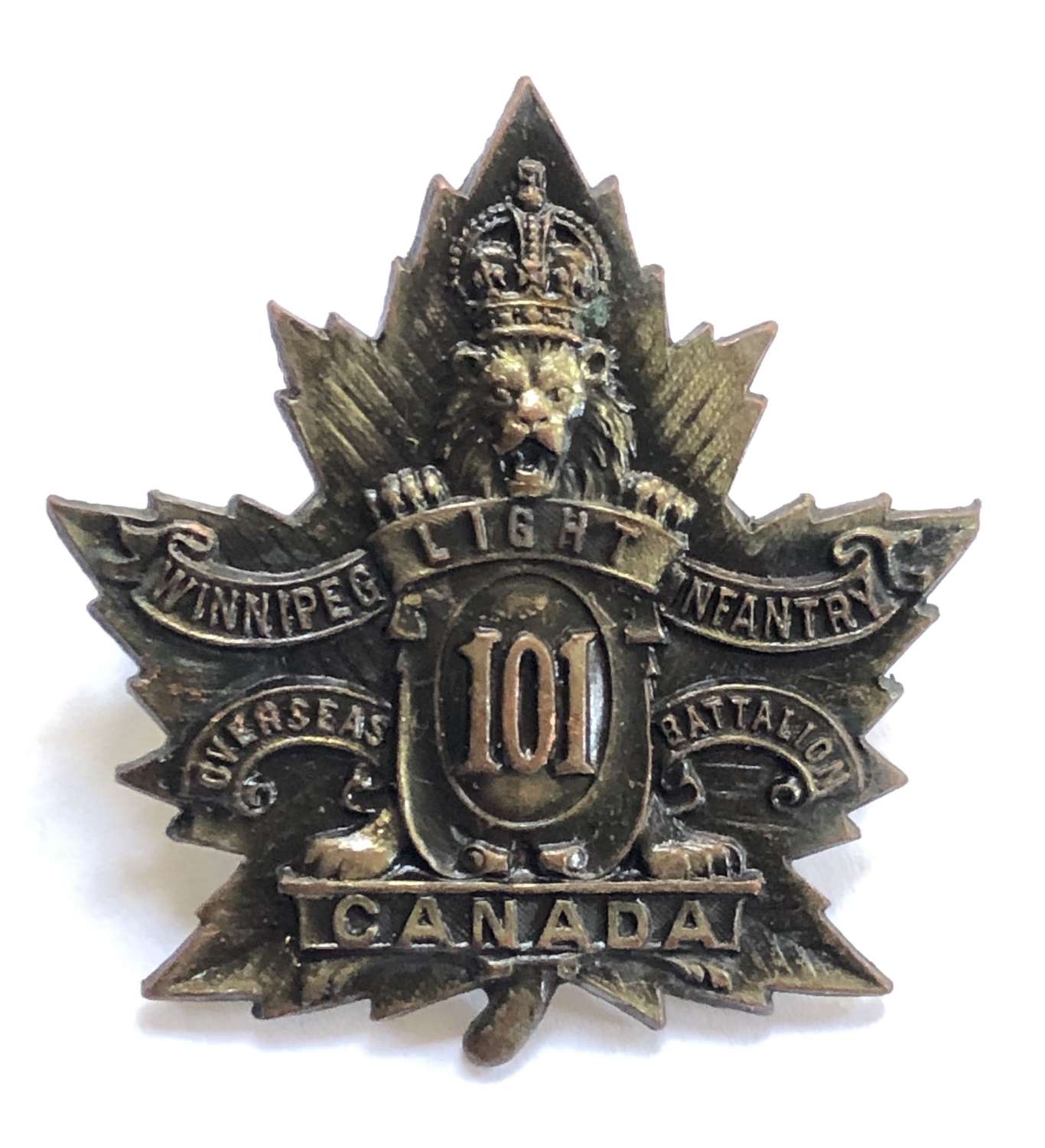 Canadian WW1 101st CEF bronze cap badge by R.J. Inglis