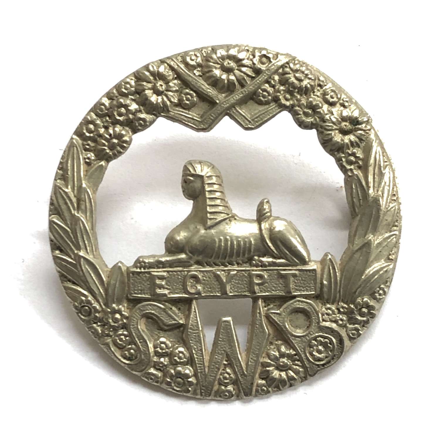 South Wales Borderers white metal cap badge c1896-1908