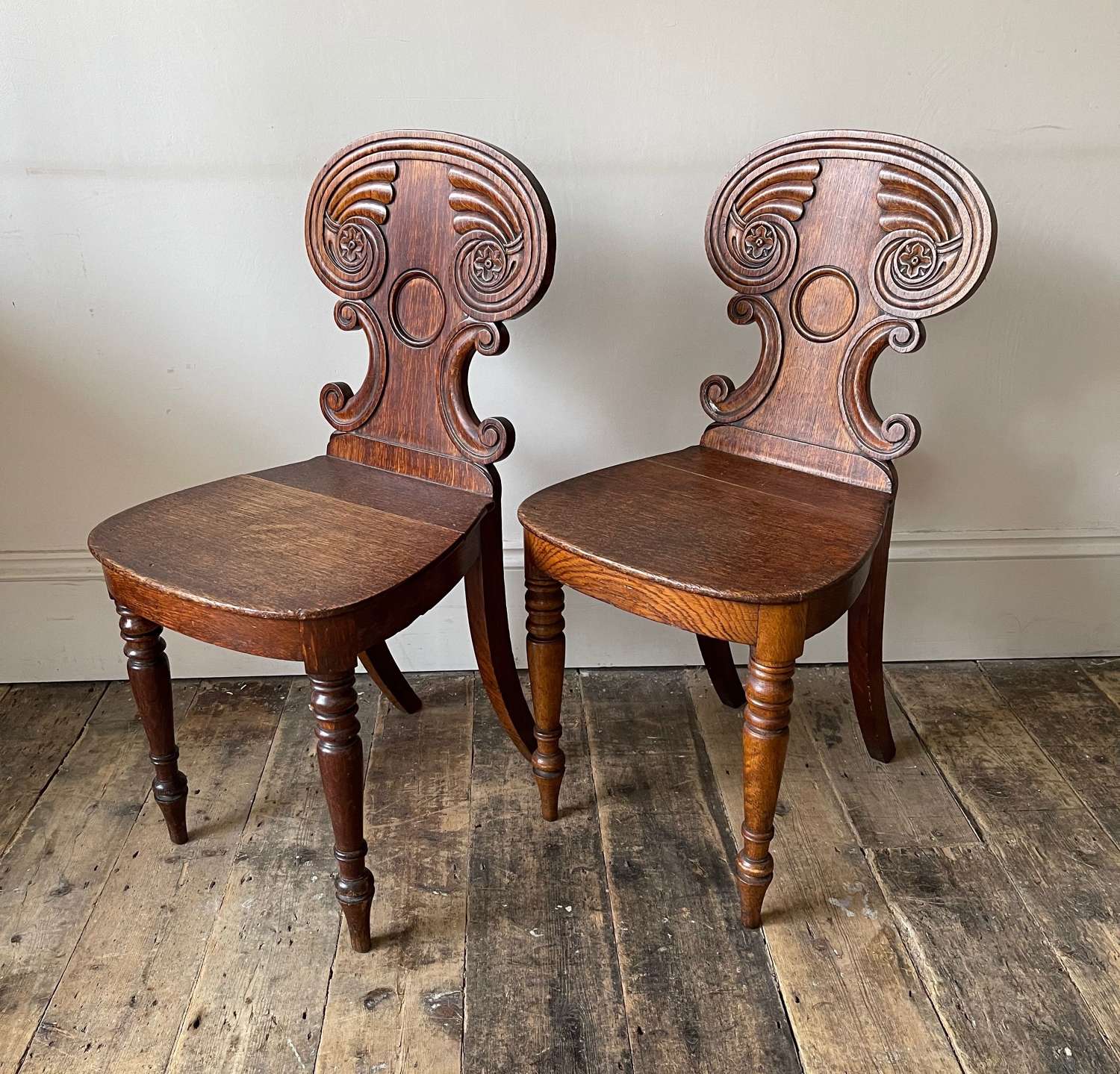 A pair of William IV hall chairs