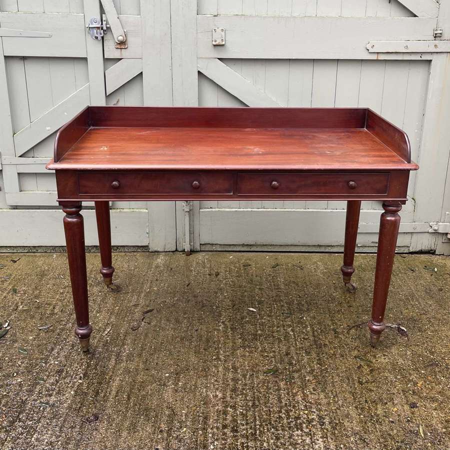 19th century writing table attributed to Holland and sons
