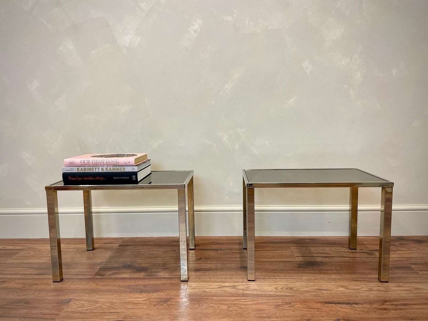 Pair of mid century smoked mirror coffee tables